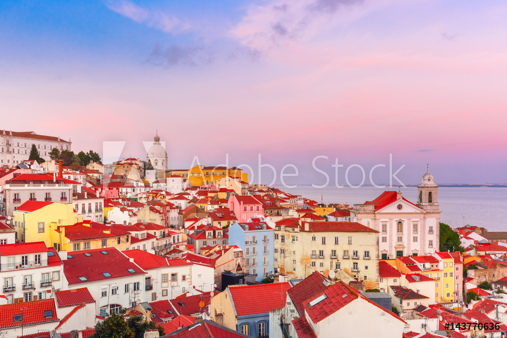 Obraz na płótnie View of Alfama, the oldest district of the Old Town, Church of Saint Stephen and National Pantheon from belvedere Miradouro das Portas do Sol at scenic sunset, Lisbon, Portugal w salonie