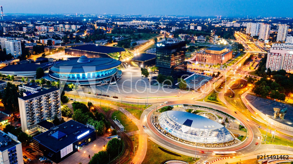 Aerial drone view on Katowice centre and roundabout at night.