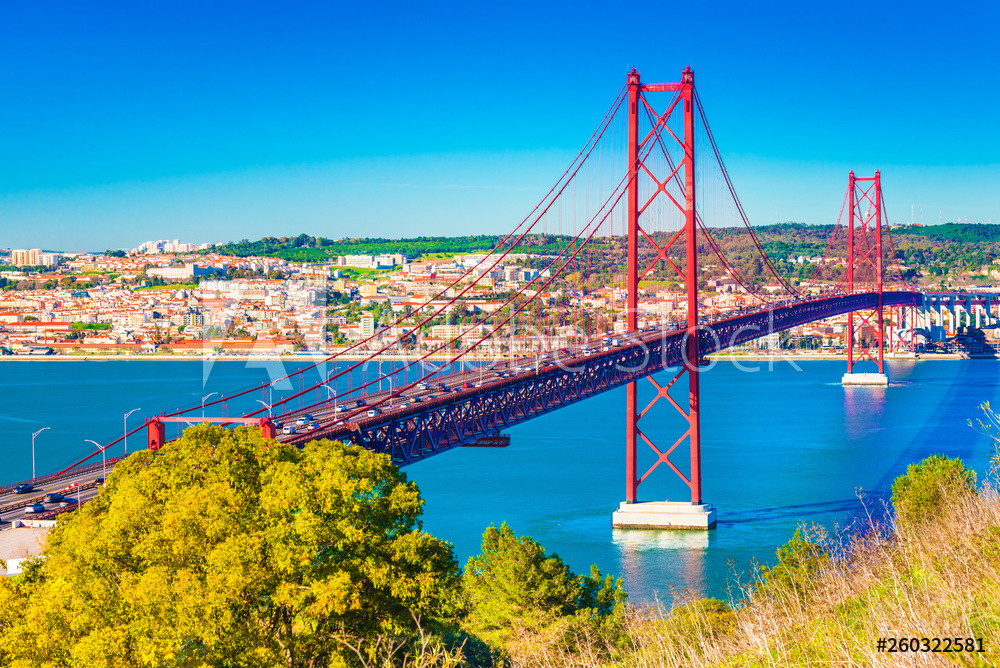 The 25th April Bridge (Ponte 25 de Abril) in Lisbon, Portugal. View from Almada